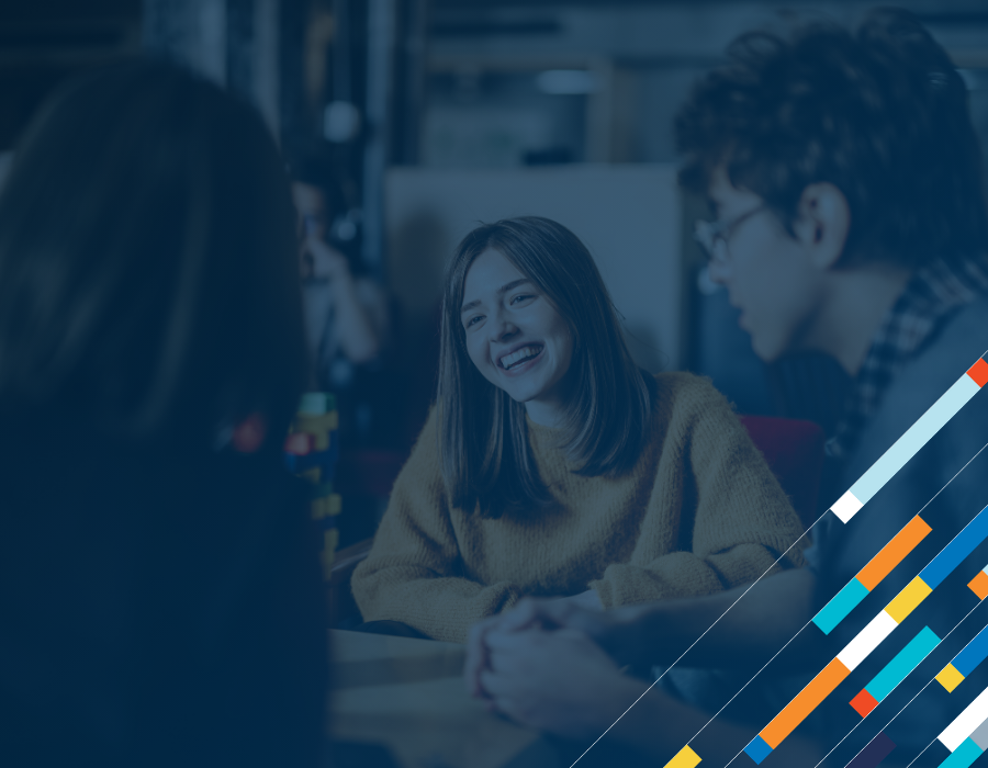 Gen Z Still Banks With You, But Their Loans Don't. Gen Z Group of Students Smiling.